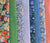 Assorted needlepoint finishing fabric in florals and velvet.