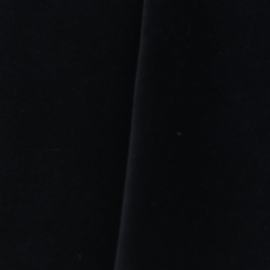 Close up view black velvet fabric.